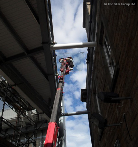 UNIC crane and GL-UMC600 installing overhead glazing