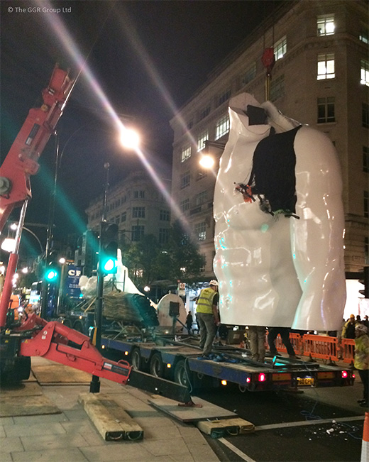 UNIC mini crane installs Selfridges statue