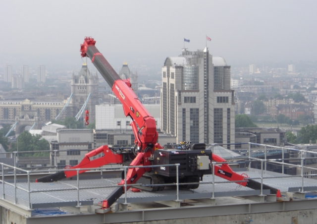 A URW-706 on top of the St Botolphs hospital has a great view of The America Square Conference Centre