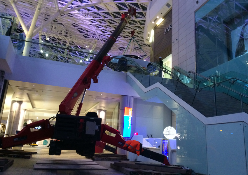 Lifting a supercar into the Westfield Shopping Centre was no problem for this URW-706 crane