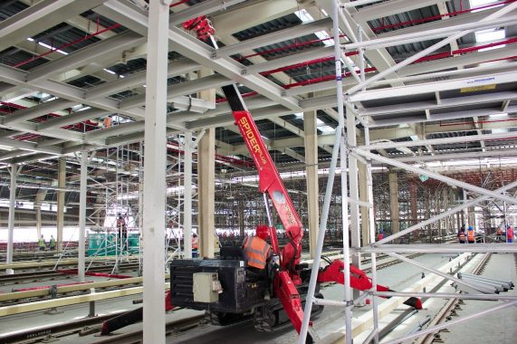 Two UNIC Cranes Lift Steel Beams In Dubai