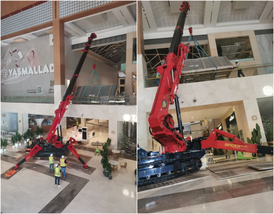 The URW-1006 Mini Spider Crane lifting curved glass.